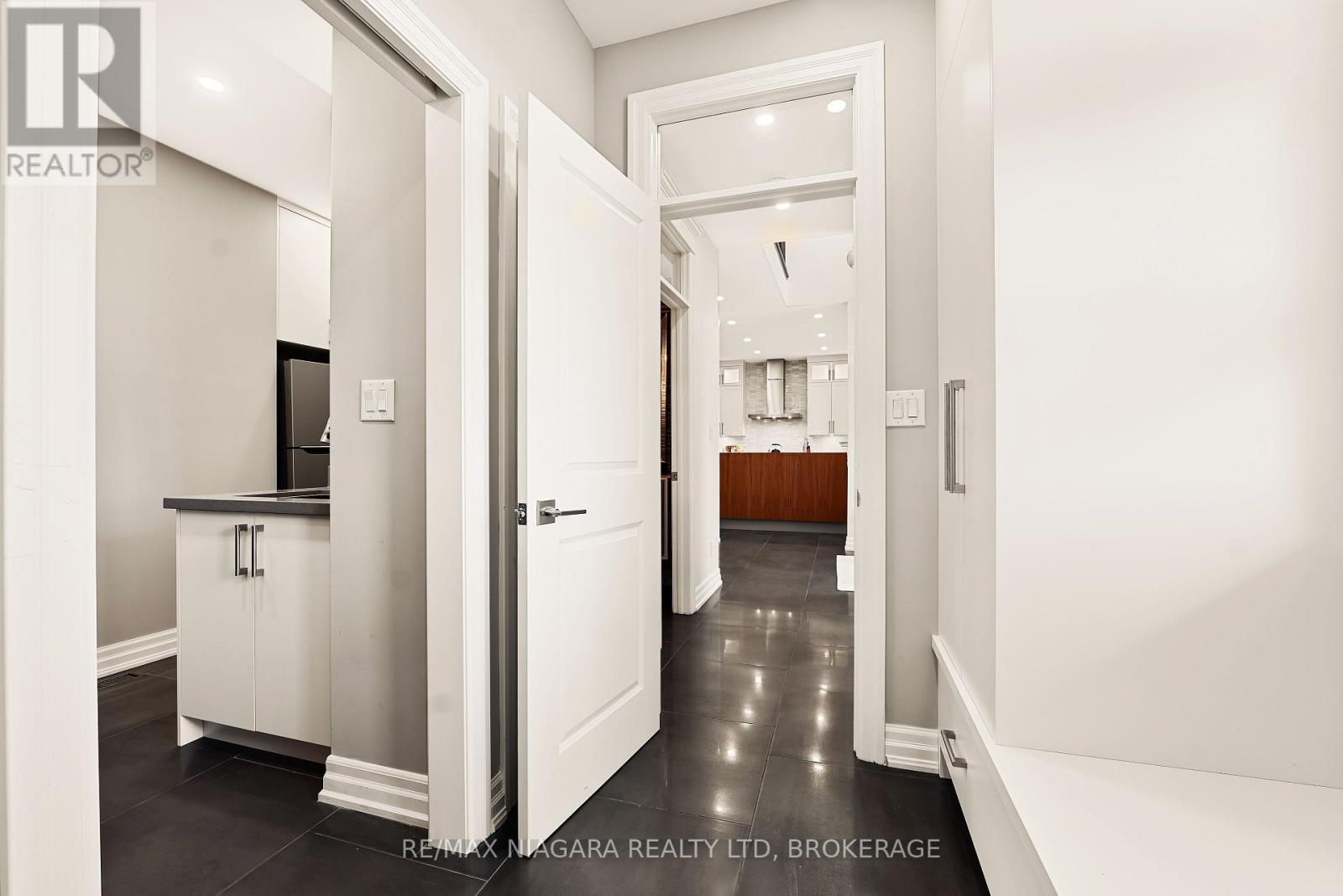 Hallway to Laundry and Garage - 1448 Four Mile Creek Road, Niagara-On-The-Lake (Virgil), ON - Indoor Photo Showing Other Room
