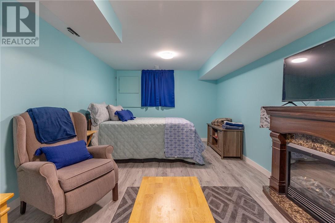 373 Avery Drive, Espanola, ON - Indoor Photo Showing Bedroom With Fireplace