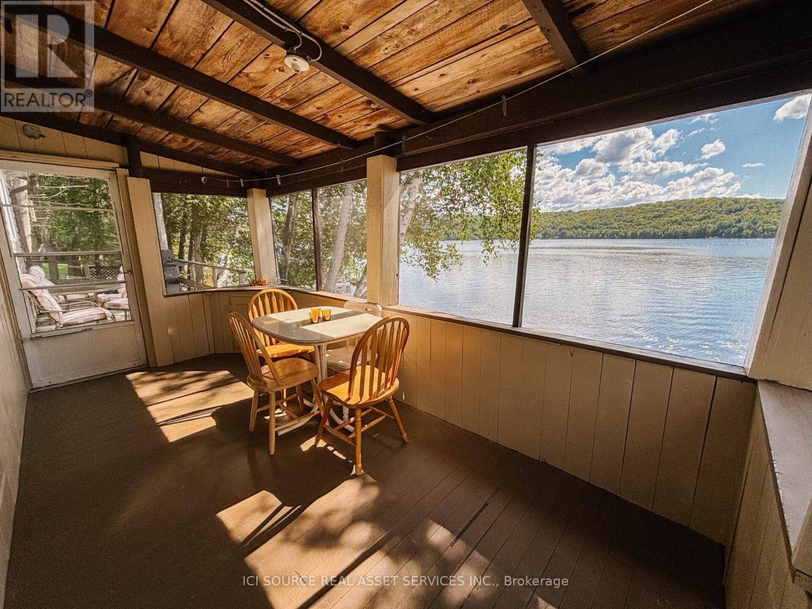 77 Odds Drive, Parry Sound Remote Area, ON - Outdoor With Body Of Water With Deck Patio Veranda