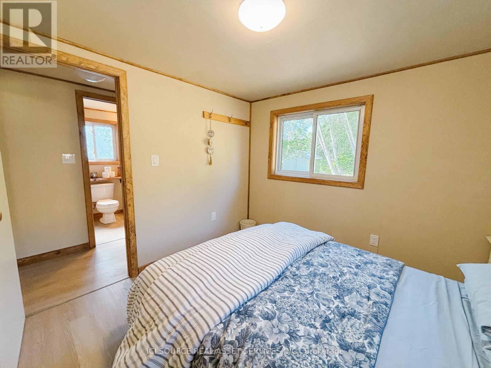 77 Odds Drive, Parry Sound Remote Area, ON - Indoor Photo Showing Bedroom