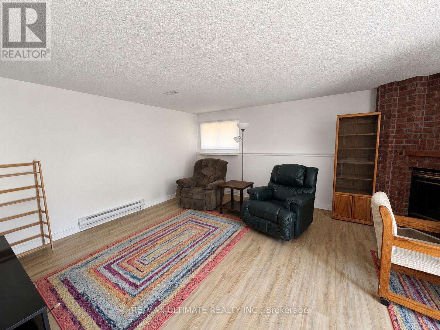 12 Stoney Brook Crescent, St. Catharines, ON - Indoor Photo Showing Living Room With Fireplace