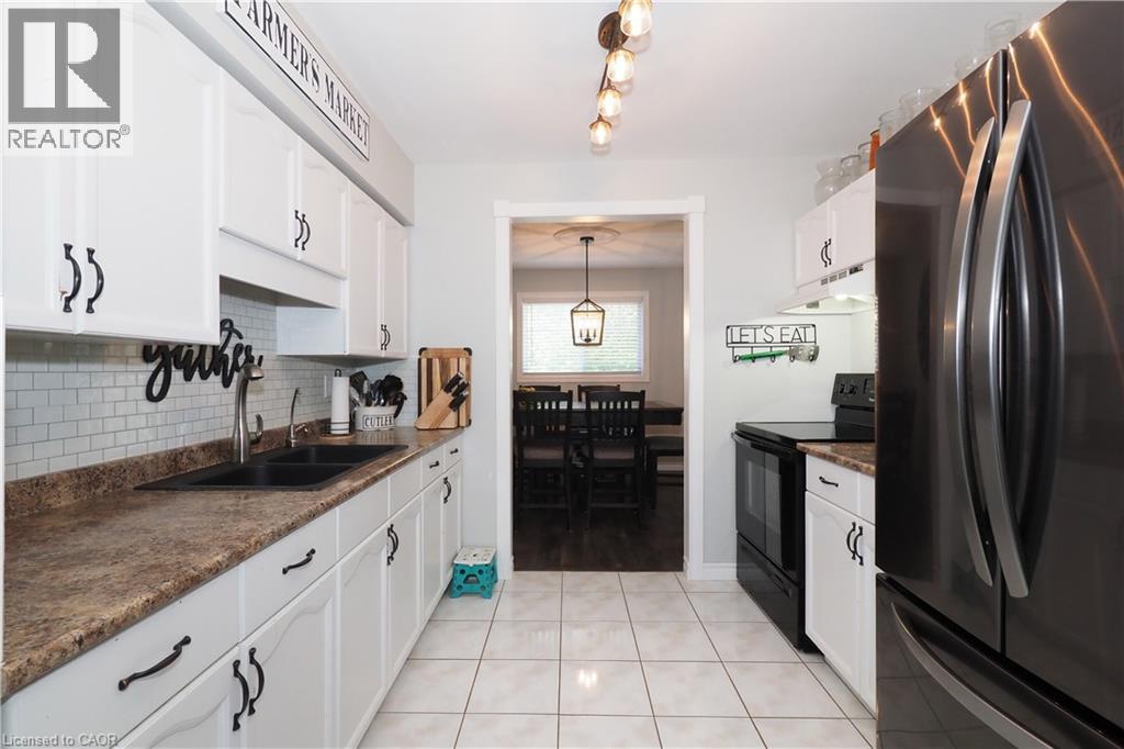 Kitchen - 15 Dales Drive, Drayton, ON - Indoor Photo Showing Kitchen With Double Sink