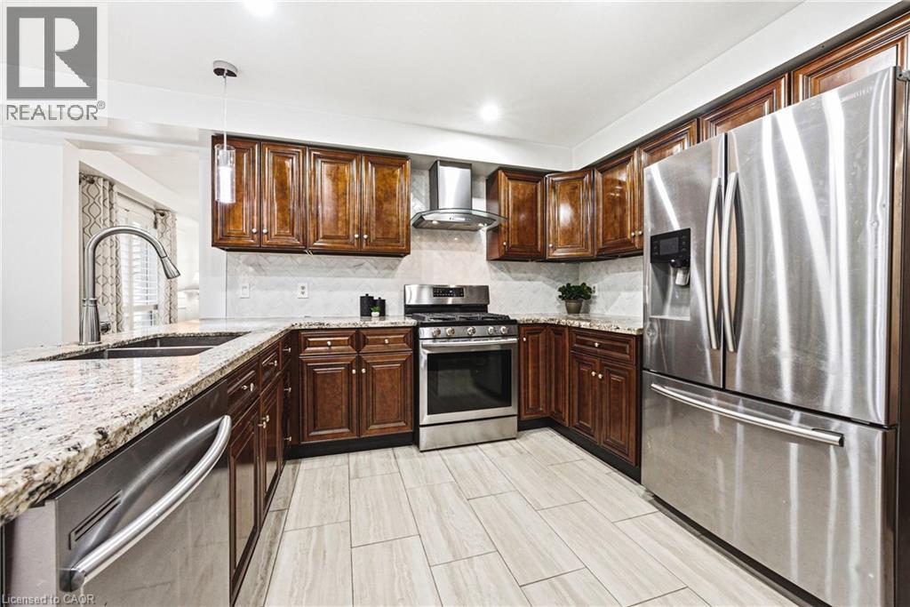3217 Sovereign Road, Burlington, ON - Indoor Photo Showing Kitchen With Stainless Steel Kitchen With Double Sink With Upgraded Kitchen