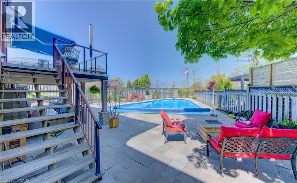 97 Manitoulin Crescent, Kitchener, ON - Outdoor With In Ground Pool With Deck Patio Veranda
