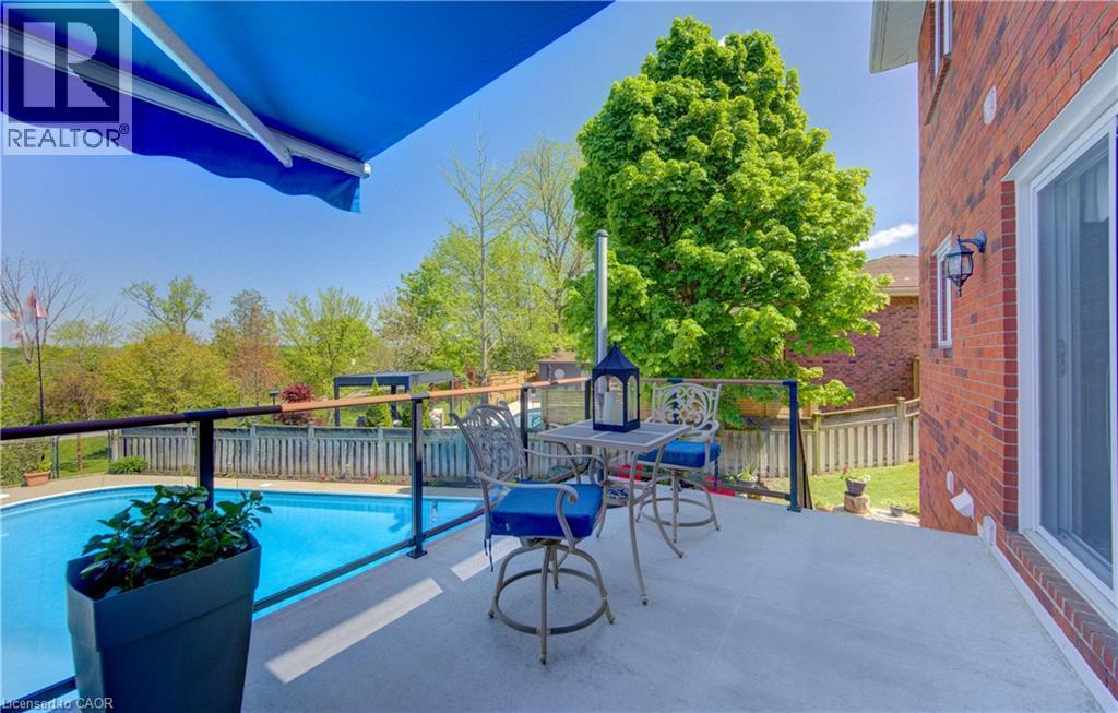 97 Manitoulin Crescent, Kitchener, ON - Outdoor With In Ground Pool With Deck Patio Veranda