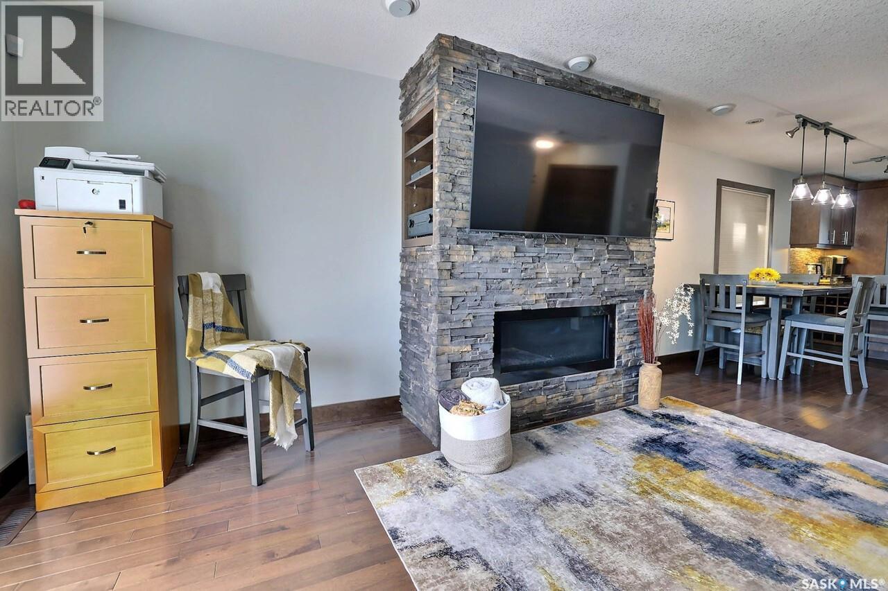 1456 Mccarthy Boulevard, Regina, SK - Indoor Photo Showing Living Room With Fireplace