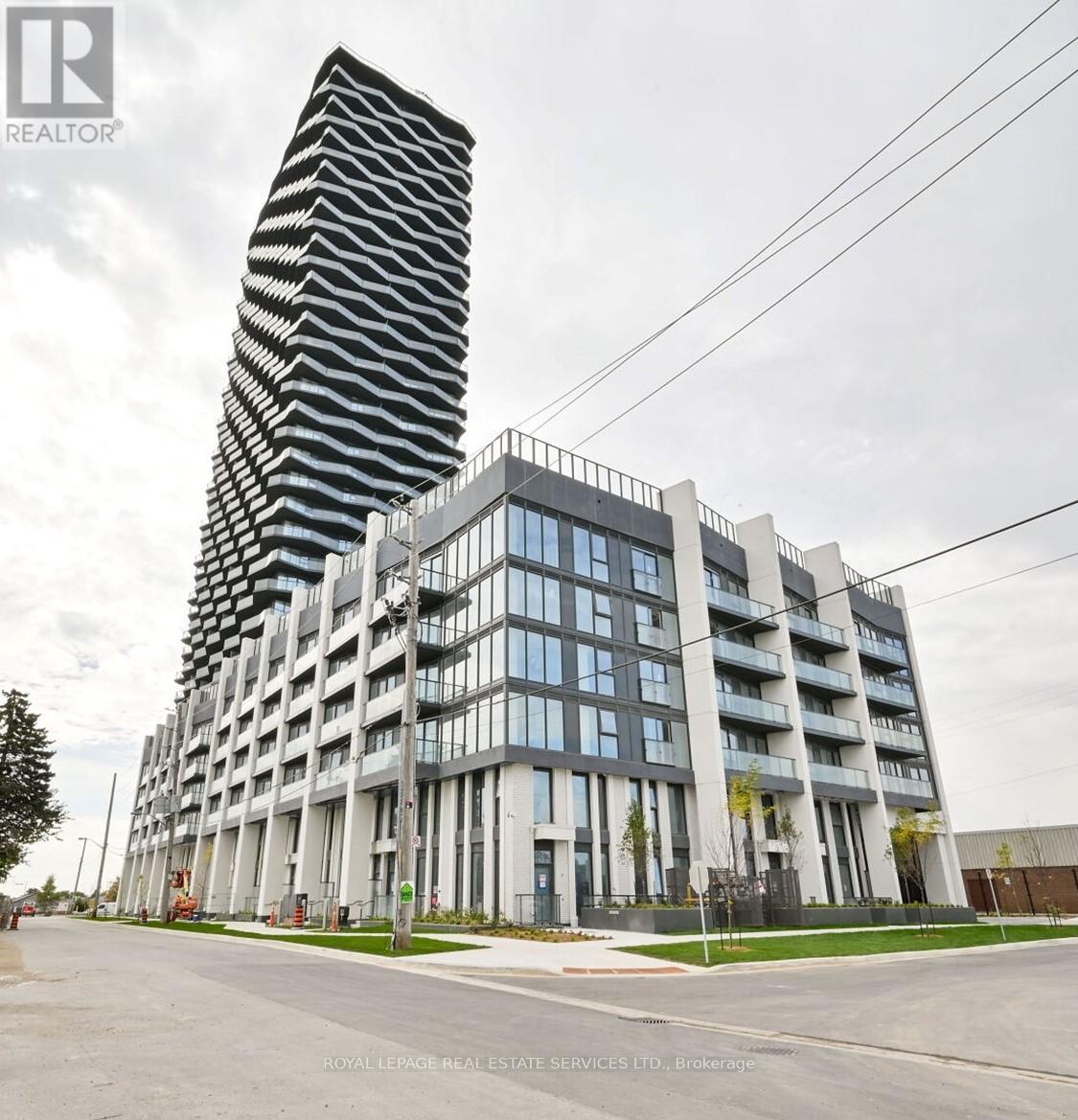 #523 - 36 Zorra Street, Toronto, ON - Outdoor With Balcony With Facade