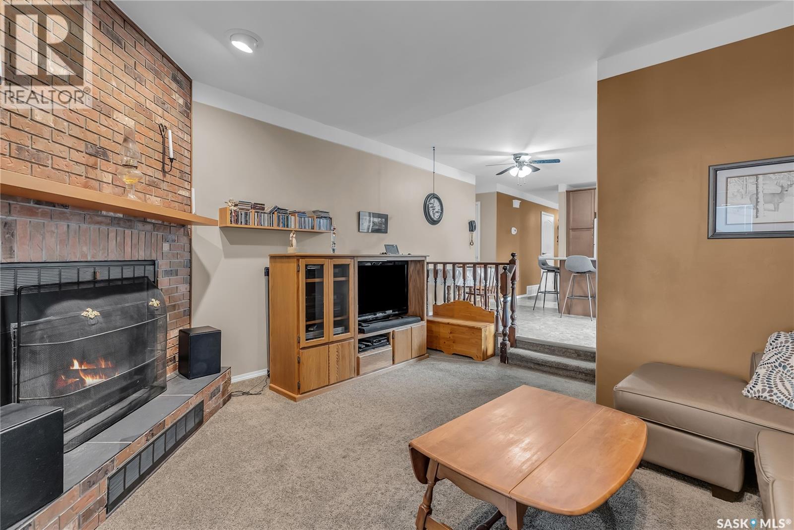 231 Benesh Crescent, Saskatoon, SK - Indoor Photo Showing Living Room With Fireplace