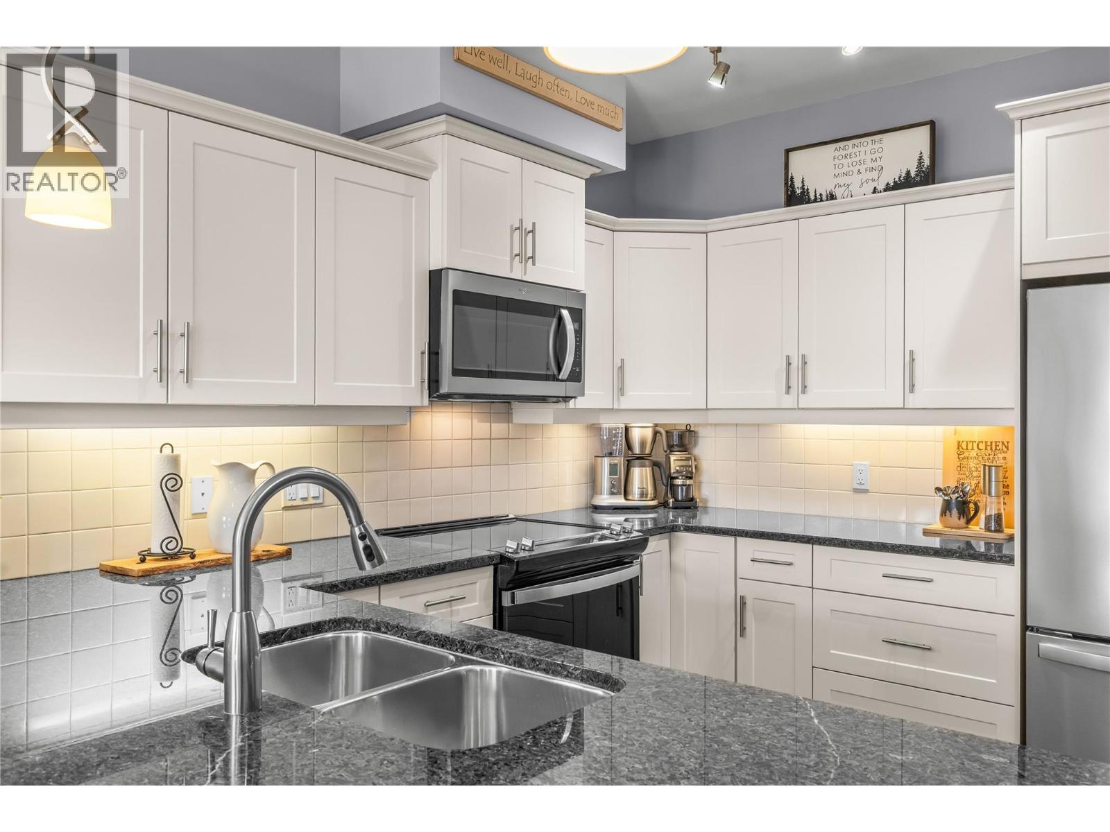 Stainless Steel Whirlpool Appliances - 3735 Casorso Road Unit# 410, Kelowna, BC - Indoor Photo Showing Kitchen With Stainless Steel Kitchen With Double Sink With Upgraded Kitchen