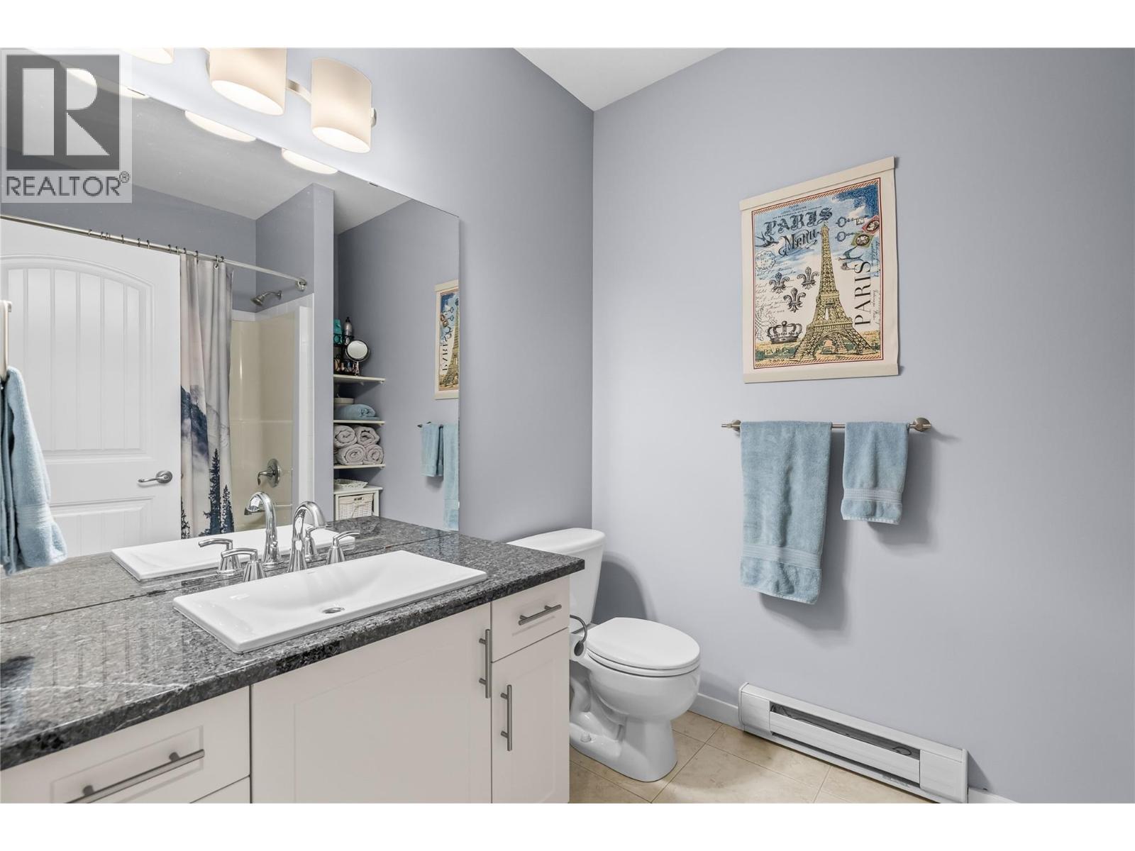 Ensuite Bathroom with Granite Countertops - 3735 Casorso Road Unit# 410, Kelowna, BC - Indoor Photo Showing Bathroom