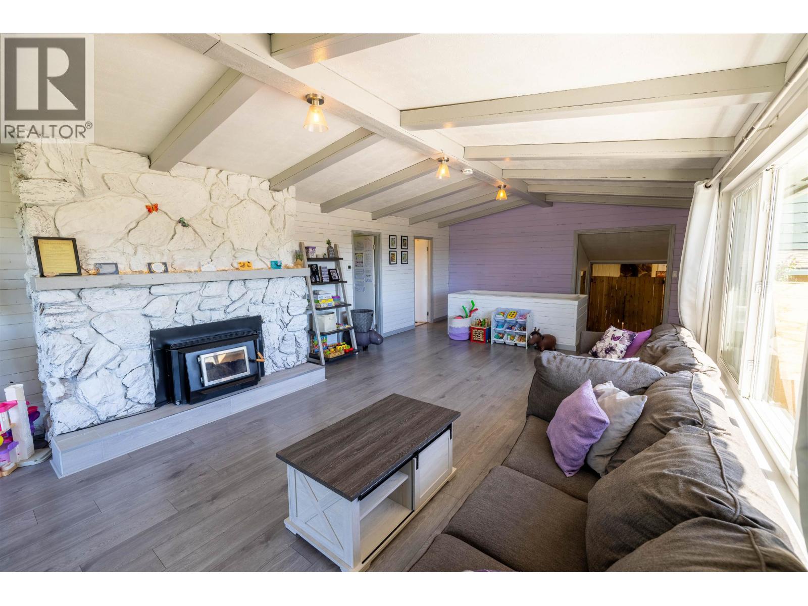 1000 Tachie Road, Fort St. James, BC - Indoor Photo Showing Living Room With Fireplace