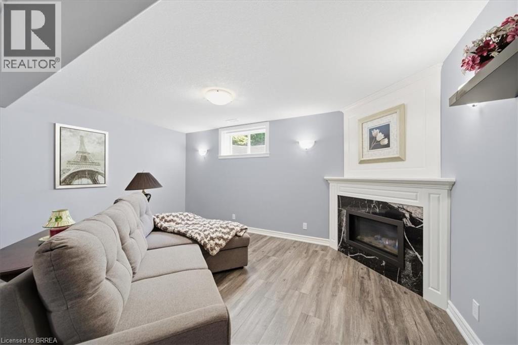 4 Lynndale Road, Simcoe, ON - Indoor Photo Showing Living Room With Fireplace