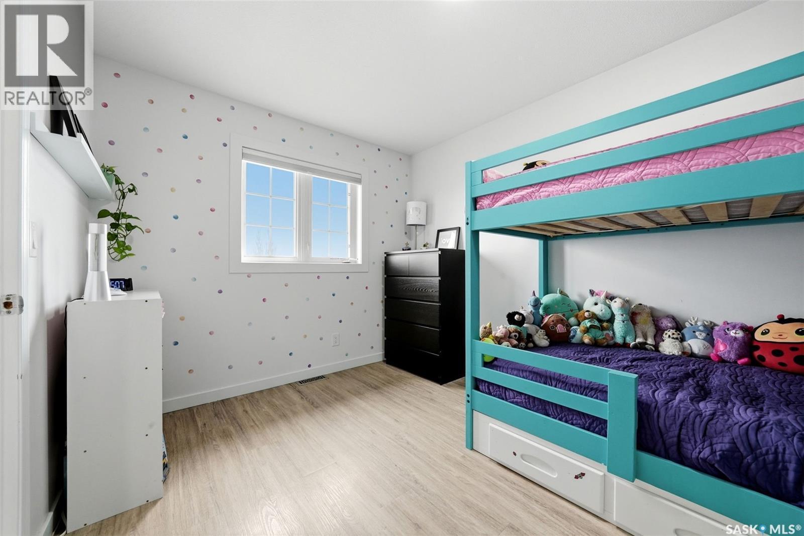 709 Aspen Crescent, Pilot Butte, SK - Indoor Photo Showing Bedroom