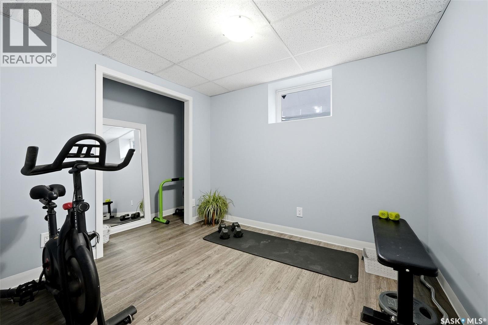 709 Aspen Crescent, Pilot Butte, SK - Indoor Photo Showing Gym Room