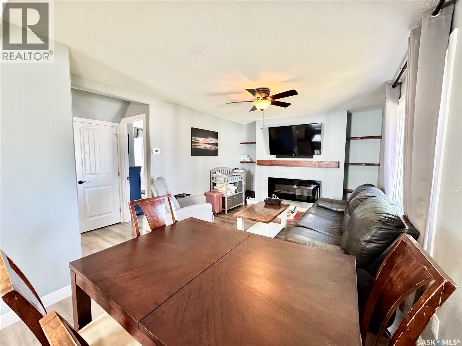 719 4Th Street E, Prince Albert, SK - Indoor Photo Showing Other Room With Fireplace