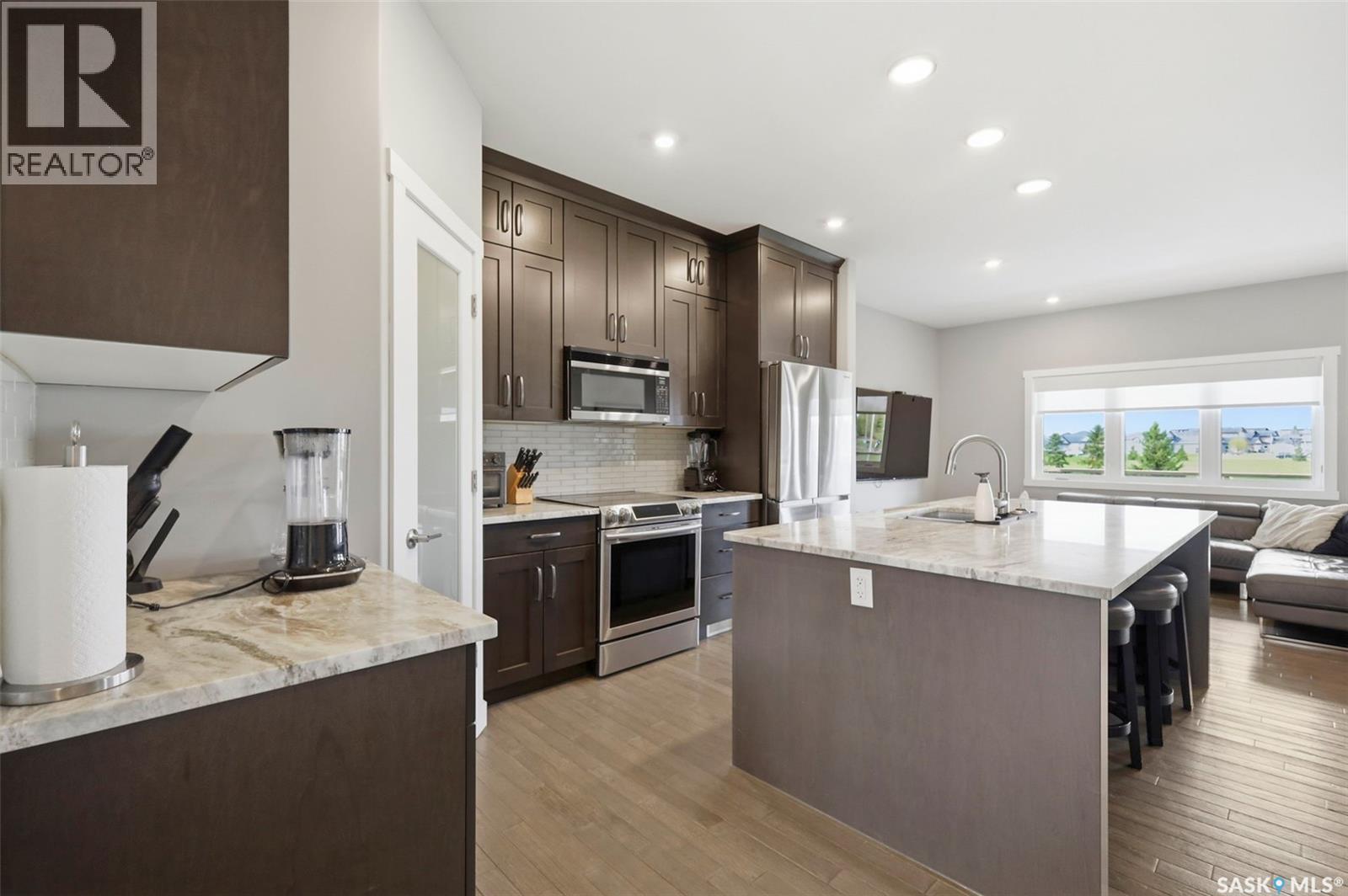 105 542 Pringle Crescent, Saskatoon, SK - Indoor Photo Showing Kitchen With Upgraded Kitchen