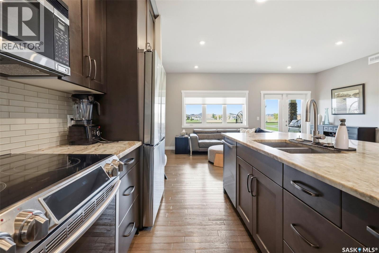 105 542 Pringle Crescent, Saskatoon, SK - Indoor Photo Showing Kitchen With Double Sink