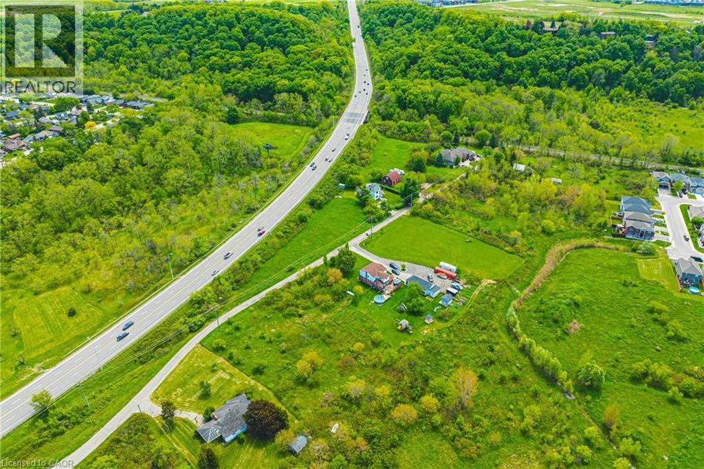 Expansive aerial perspective showcasing a rural landscape with significant green space - 83 Webster Road, Hamilton, ON