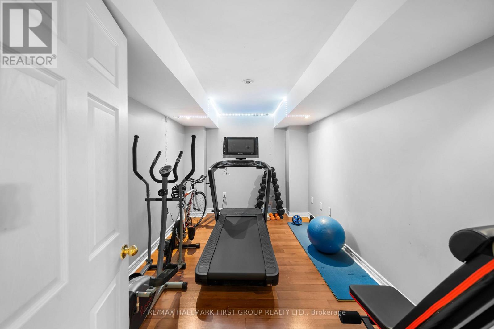 62 Cachet Boulevard, Whitby, ON - Indoor Photo Showing Gym Room