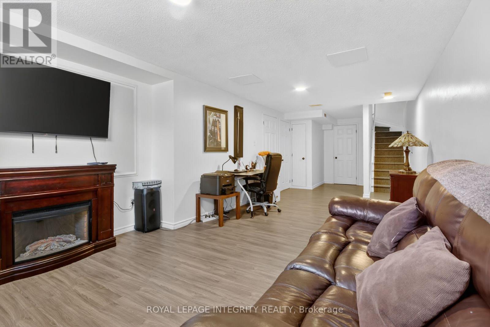 1 Chantilly Gate, Ottawa, ON - Indoor Photo Showing Living Room With Fireplace