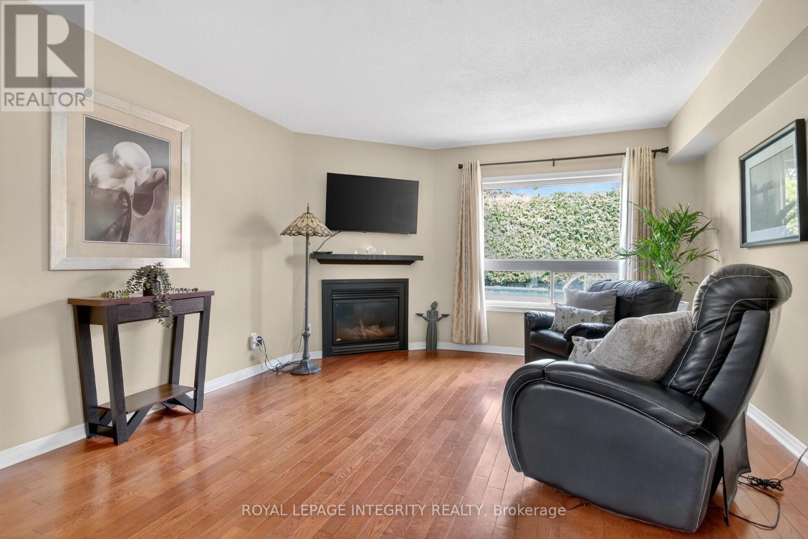 1 Chantilly Gate, Ottawa, ON - Indoor Photo Showing Living Room With Fireplace