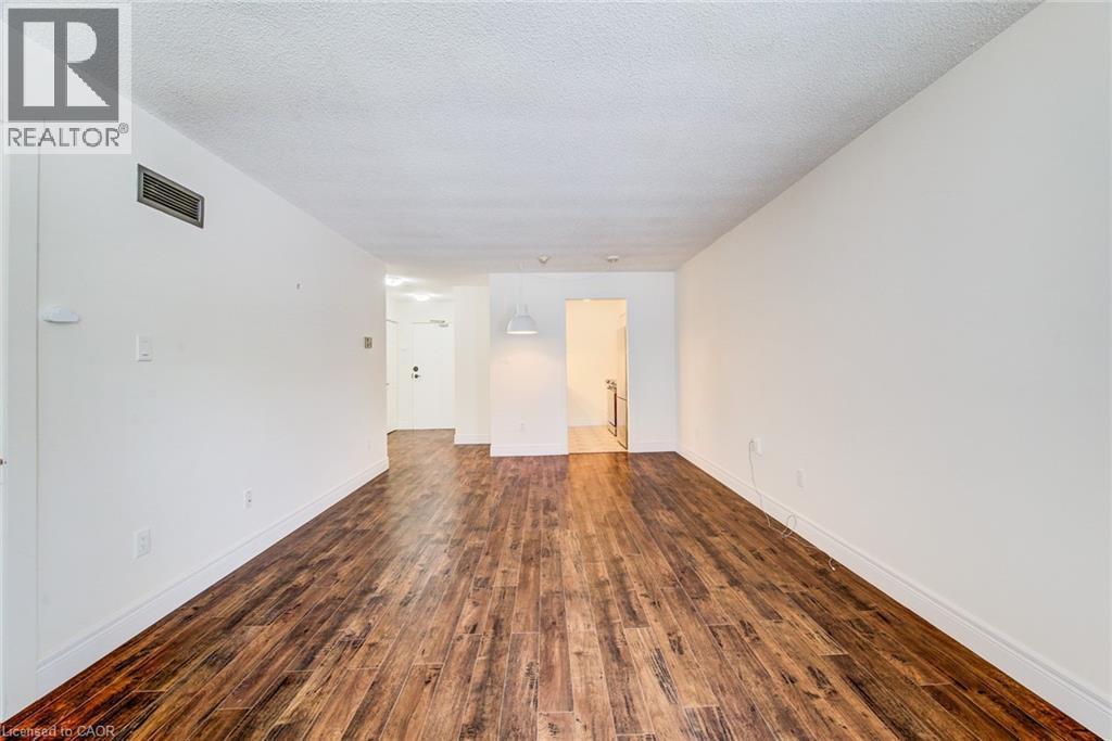Spacious living and dining spaces - 1414 King Street E Unit# 101, Kitchener, ON - Indoor Photo Showing Other Room