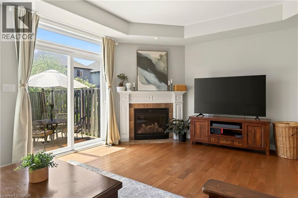 62 Fall Fair Way, Binbrook, ON - Indoor Photo Showing Living Room With Fireplace