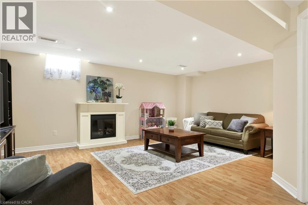 62 Fall Fair Way, Binbrook, ON - Indoor Photo Showing Living Room With Fireplace