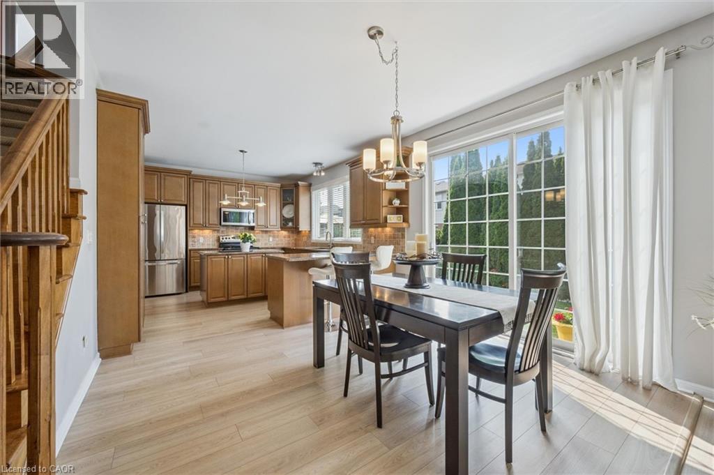 Kitchen space off of Family Room with access via oversize patio doors to fenced backyard - 79 Zieman Crescent, Cambridge, ON - Indoor Photo Showing Dining Room