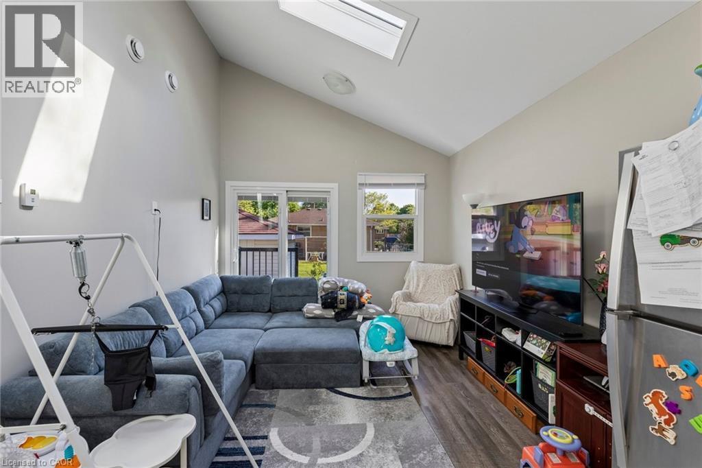 Unit B- Living Room with access to private fenced backyard - 158 Laurentian Drive N, London, ON - Indoor Photo Showing Living Room