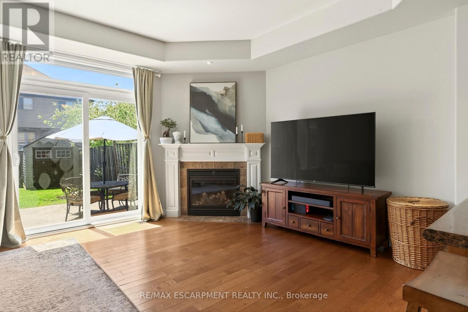 62 Fall Fair Way, Hamilton, ON - Indoor Photo Showing Living Room With Fireplace