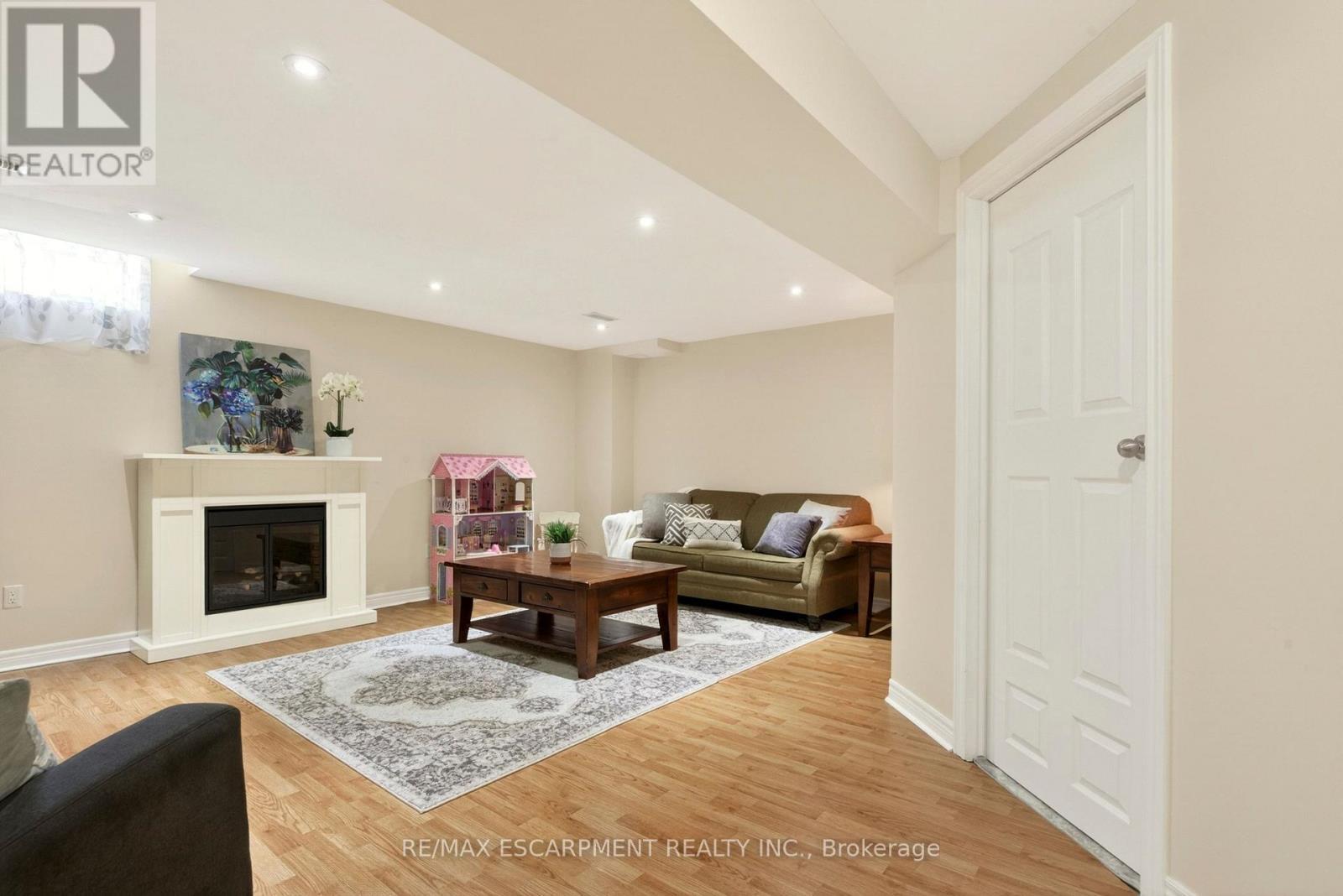 62 Fall Fair Way, Hamilton, ON - Indoor Photo Showing Living Room With Fireplace
