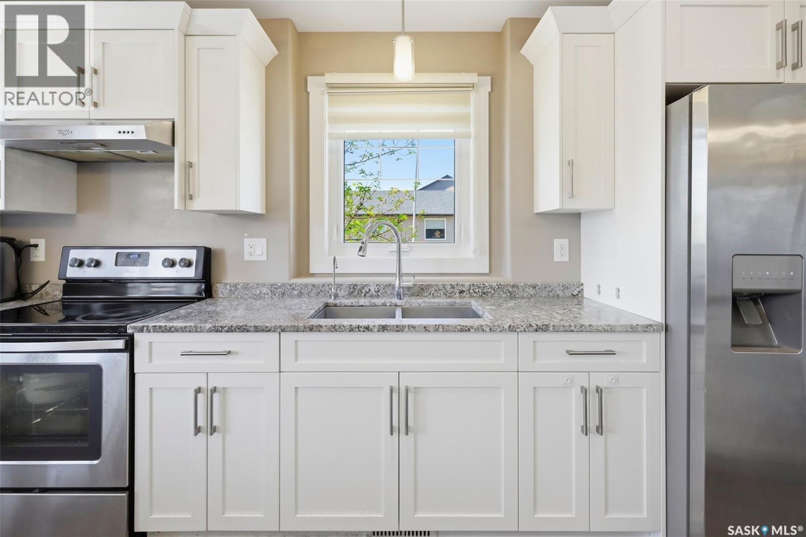 201 Rajput Way, Saskatoon, SK - Indoor Photo Showing Kitchen With Stainless Steel Kitchen With Double Sink With Upgraded Kitchen