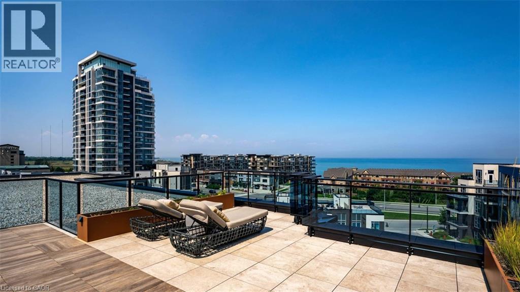 10 Concord Place Unit# 213, Grimsby, ON - Outdoor With Body Of Water