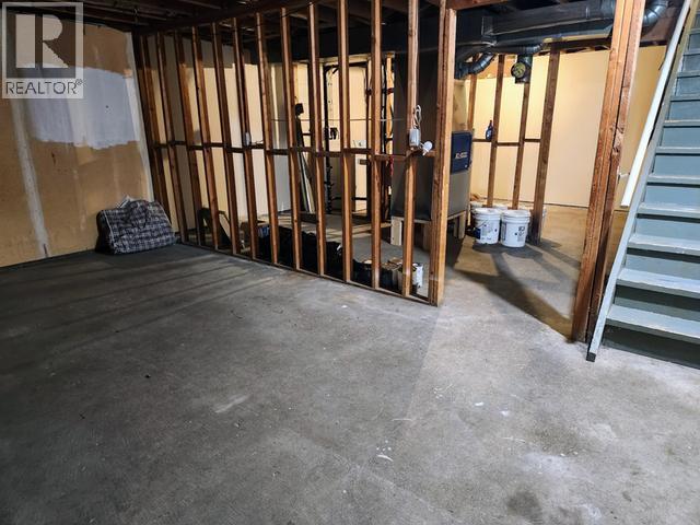 116 Kitza Avenue, Faro, YT - Indoor Photo Showing Basement