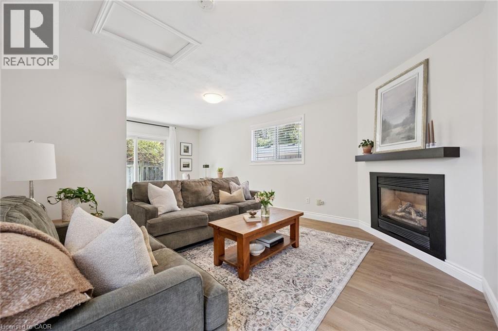 793 Belmont Avenue W, Kitchener, ON - Indoor Photo Showing Living Room With Fireplace