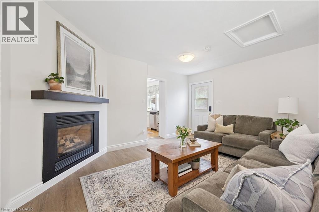 793 Belmont Avenue W, Kitchener, ON - Indoor Photo Showing Living Room With Fireplace