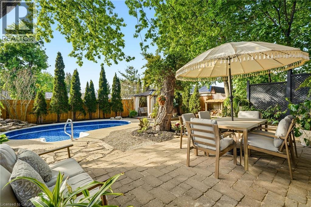329 Plains Road W, Burlington, ON - Outdoor With In Ground Pool With Deck Patio Veranda With Backyard