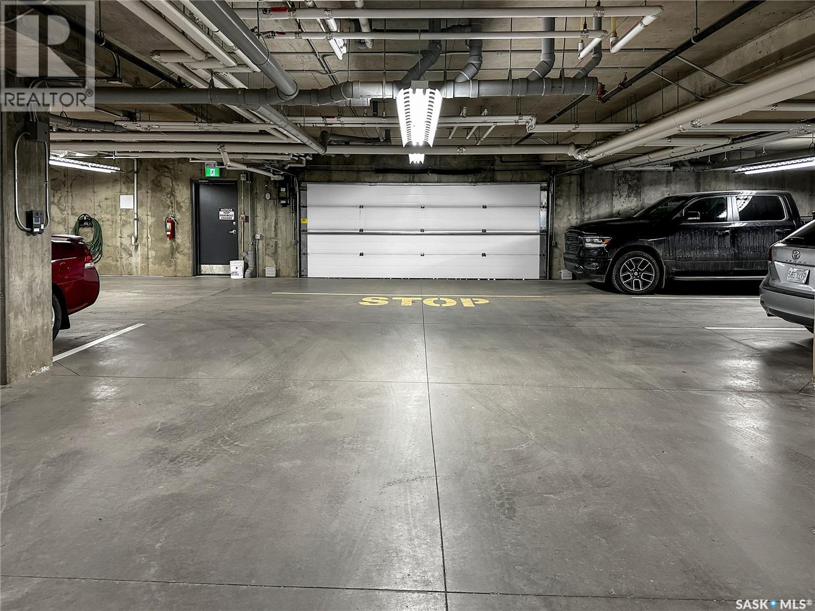 305 2452 Killdeer Drive, North Battleford, SK - Indoor Photo Showing Garage