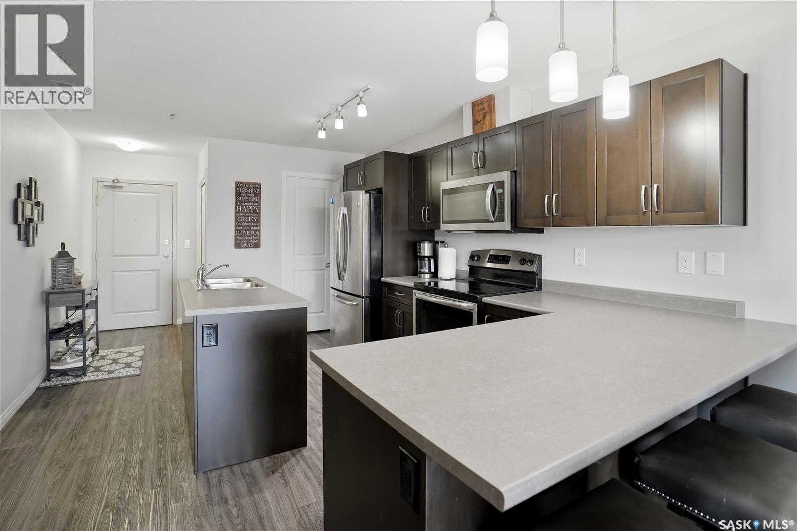 305 2452 Killdeer Drive, North Battleford, SK - Indoor Photo Showing Kitchen With Stainless Steel Kitchen