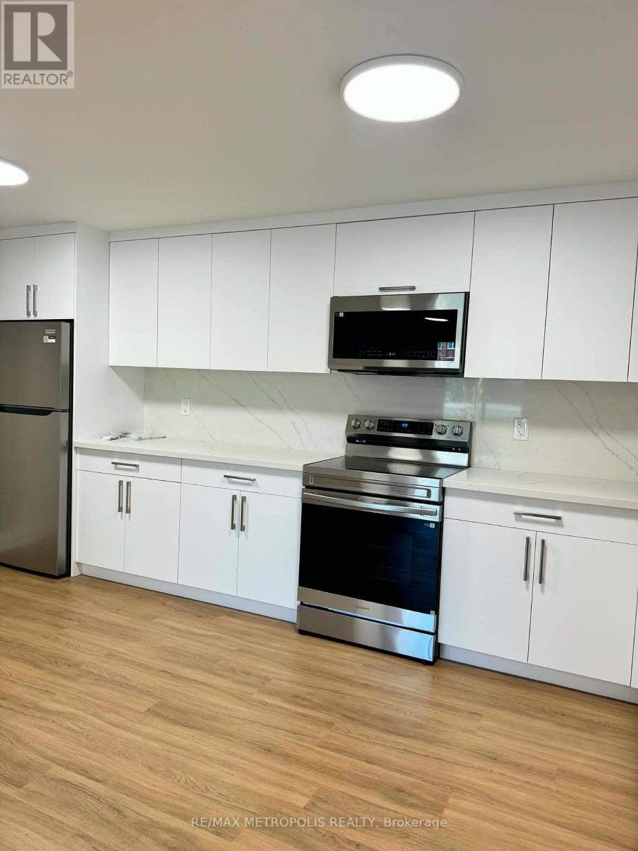 106 - 1445 Wilson Avenue, Toronto, ON - Indoor Photo Showing Kitchen