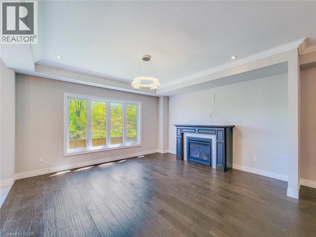 7 Chardonnay Street, Hamilton, ON - Indoor Photo Showing Living Room With Fireplace