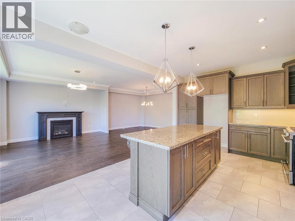 7 Chardonnay Street, Hamilton, ON - Indoor Photo Showing Kitchen With Fireplace