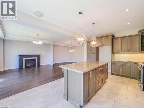 7 Chardonnay Street, Hamilton, ON - Indoor Photo Showing Kitchen With Fireplace