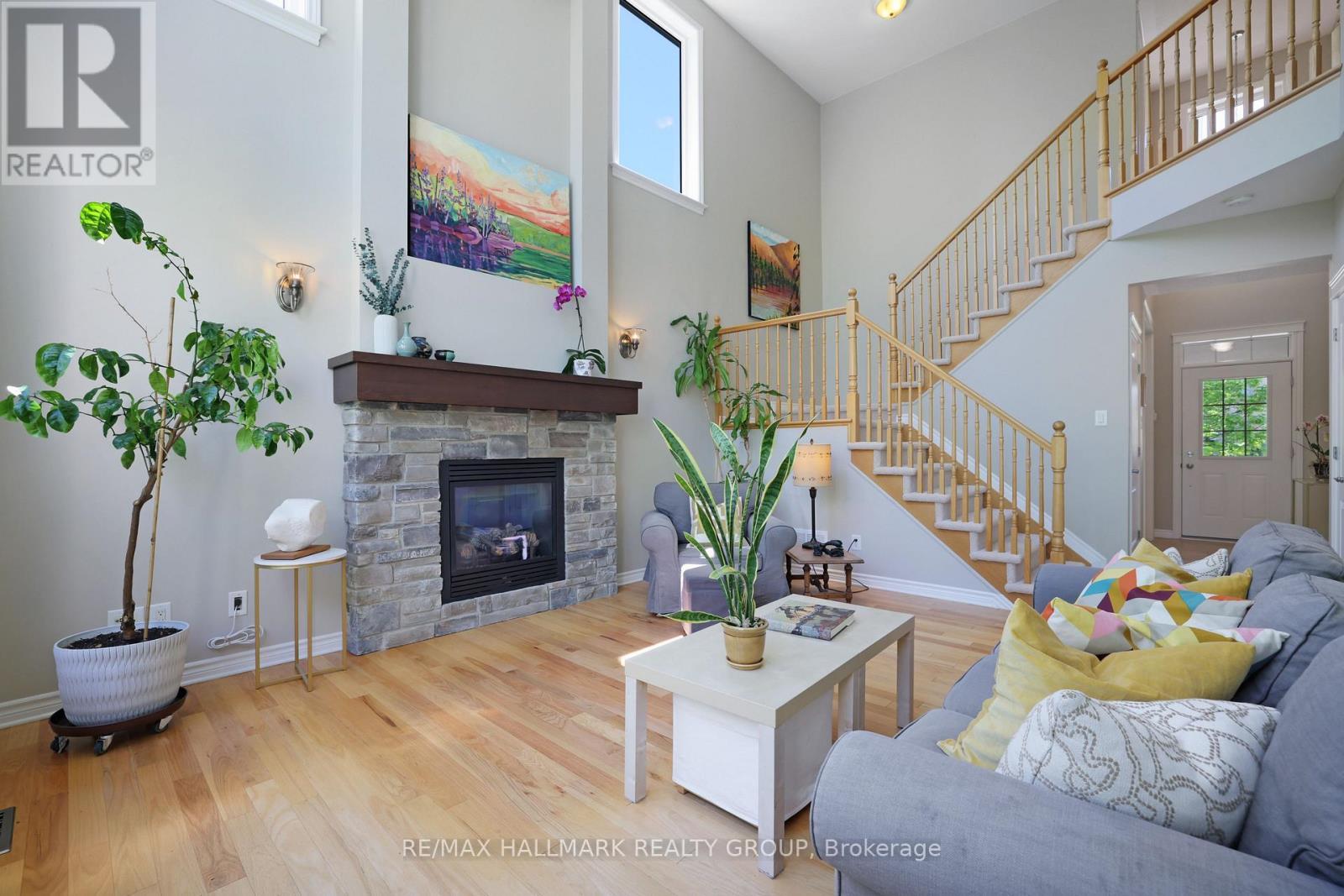 90 Stonewater Bay, Carleton Place, ON - Indoor Photo Showing Living Room With Fireplace