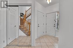 Expansive foyer with ceramic tile -