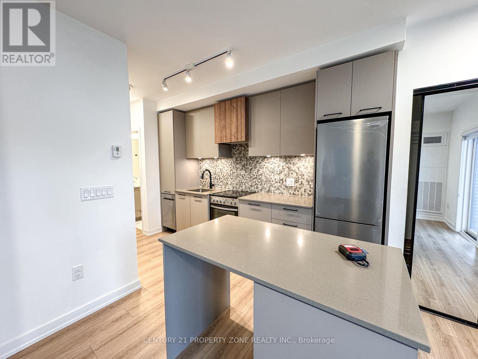 06 - 20 Lagerfeld Drive, Brampton, ON - Indoor Photo Showing Kitchen With Upgraded Kitchen