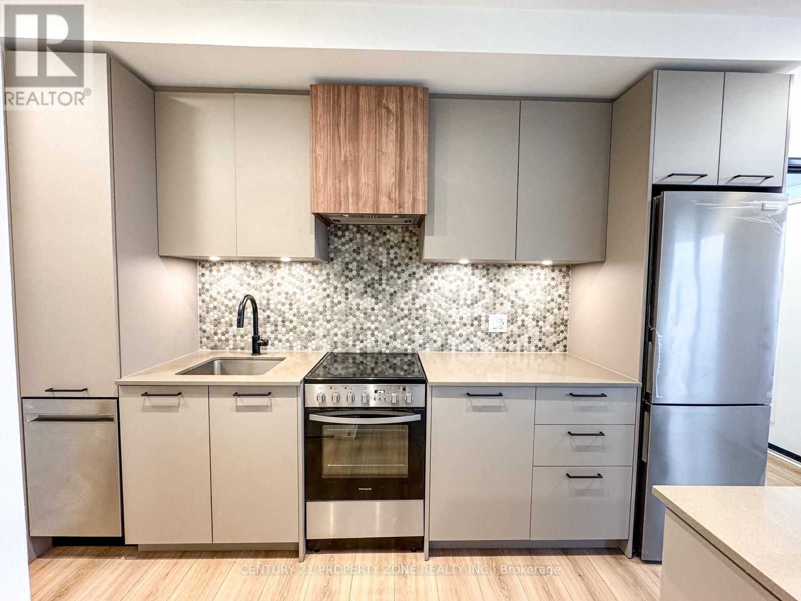 06 - 20 Lagerfeld Drive, Brampton, ON - Indoor Photo Showing Kitchen With Upgraded Kitchen