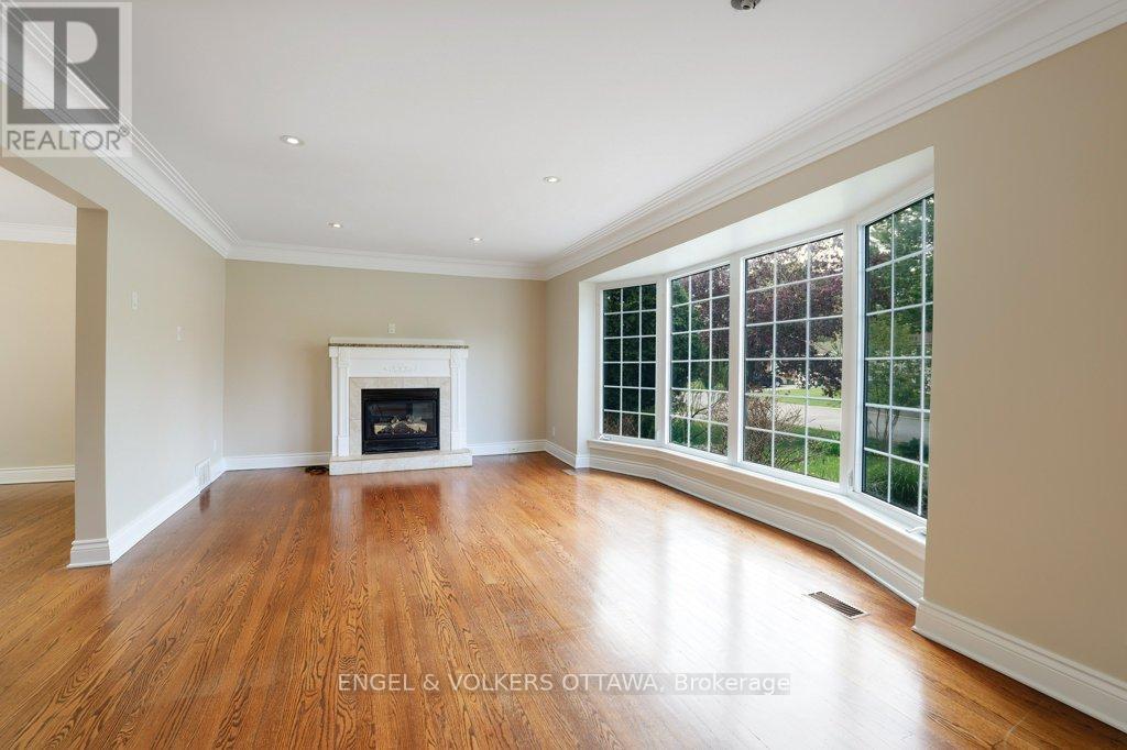 23 Biscayne Crescent, Ottawa, ON - Indoor Photo Showing Living Room With Fireplace