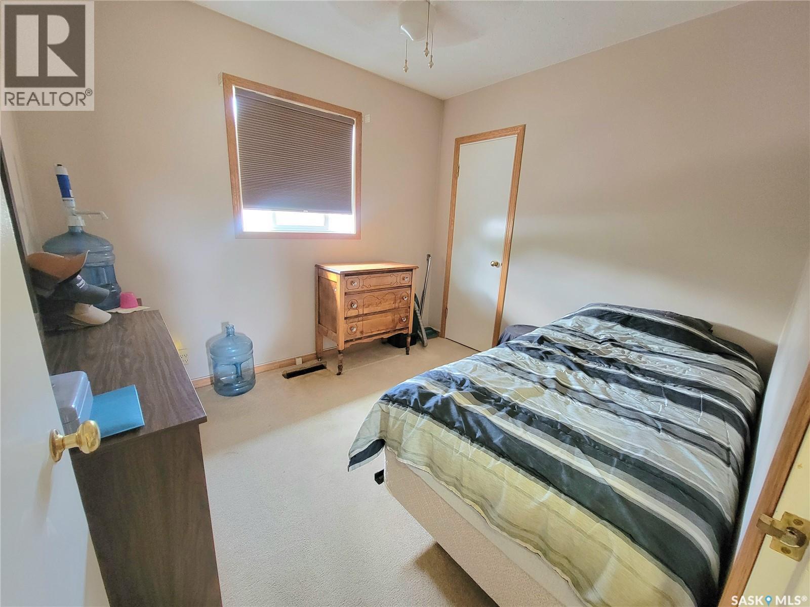 303 3 Street E, Wilkie, SK - Indoor Photo Showing Bedroom